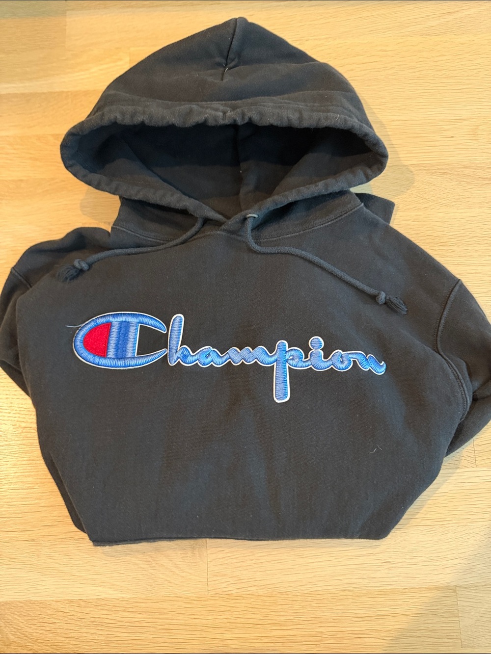 Champion Black Hoodie with Blue and Red Script Logo